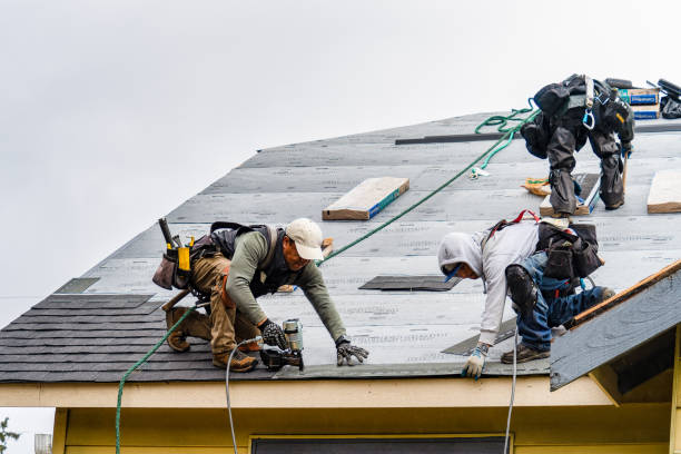 Professional Gutter Installation technician working in Bessemer, MI